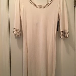 White bodycon knit dress with embellishments